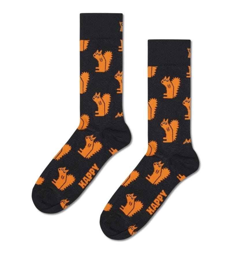Squirrel Socks with playful orange squirrel pattern on black background.
